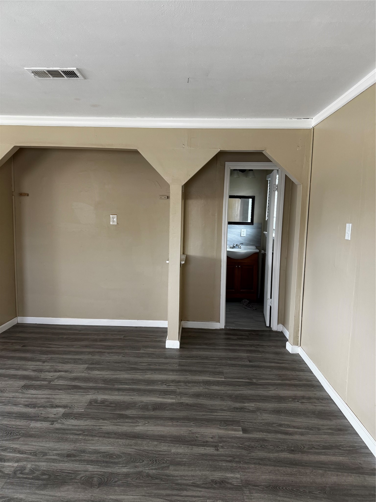 4515 7th Street Bacliff, TX 77518 - Photo 6 of 15 a view of a livingroom with wooden floor and staircase