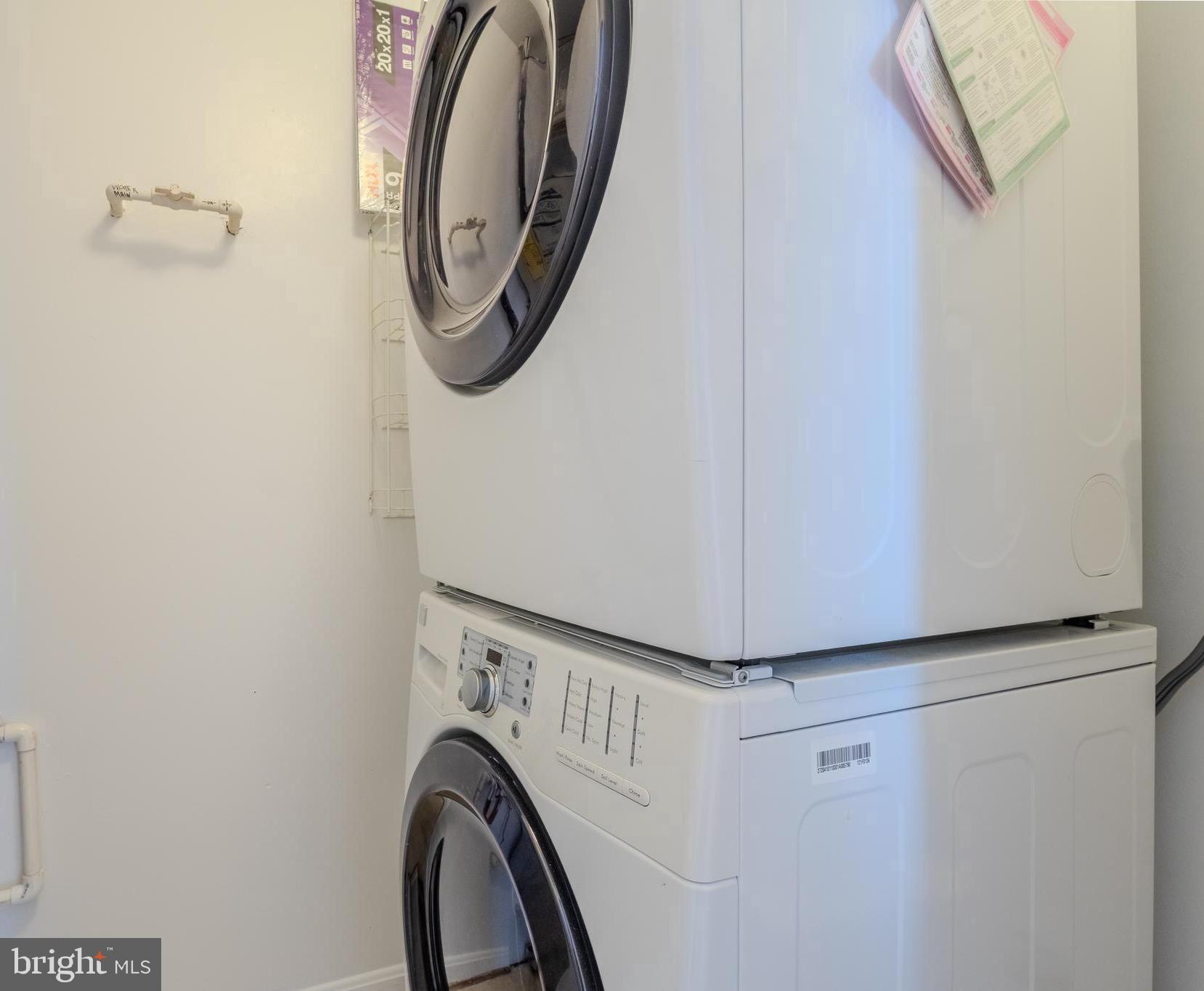 2015 Governor Thomas Bladen Way, Unit 104 Annapolis, MD 21401 - Photo 15 of 32 a utility room with dryer and washer