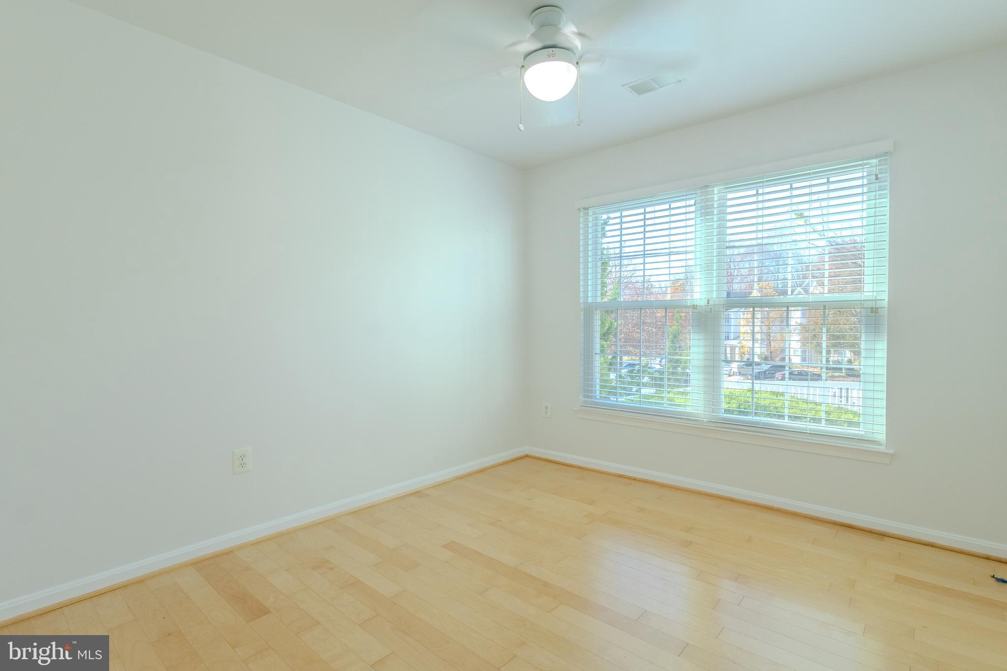 2015 Governor Thomas Bladen Way, Unit 104 Annapolis, MD 21401 - Photo 17 of 32 an empty room with a window