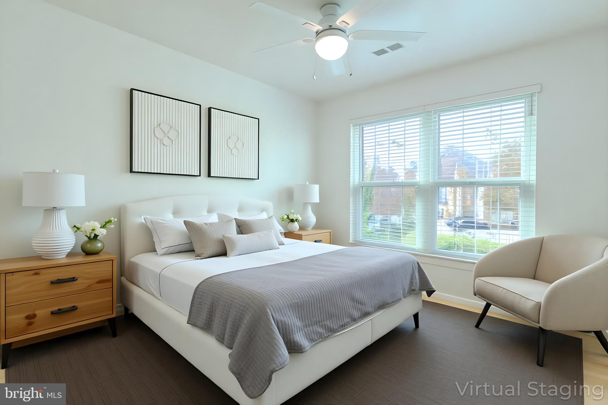 2015 Governor Thomas Bladen Way, Unit 104 Annapolis, MD 21401 - Photo 18 of 32 a bedroom with a bed and a couch