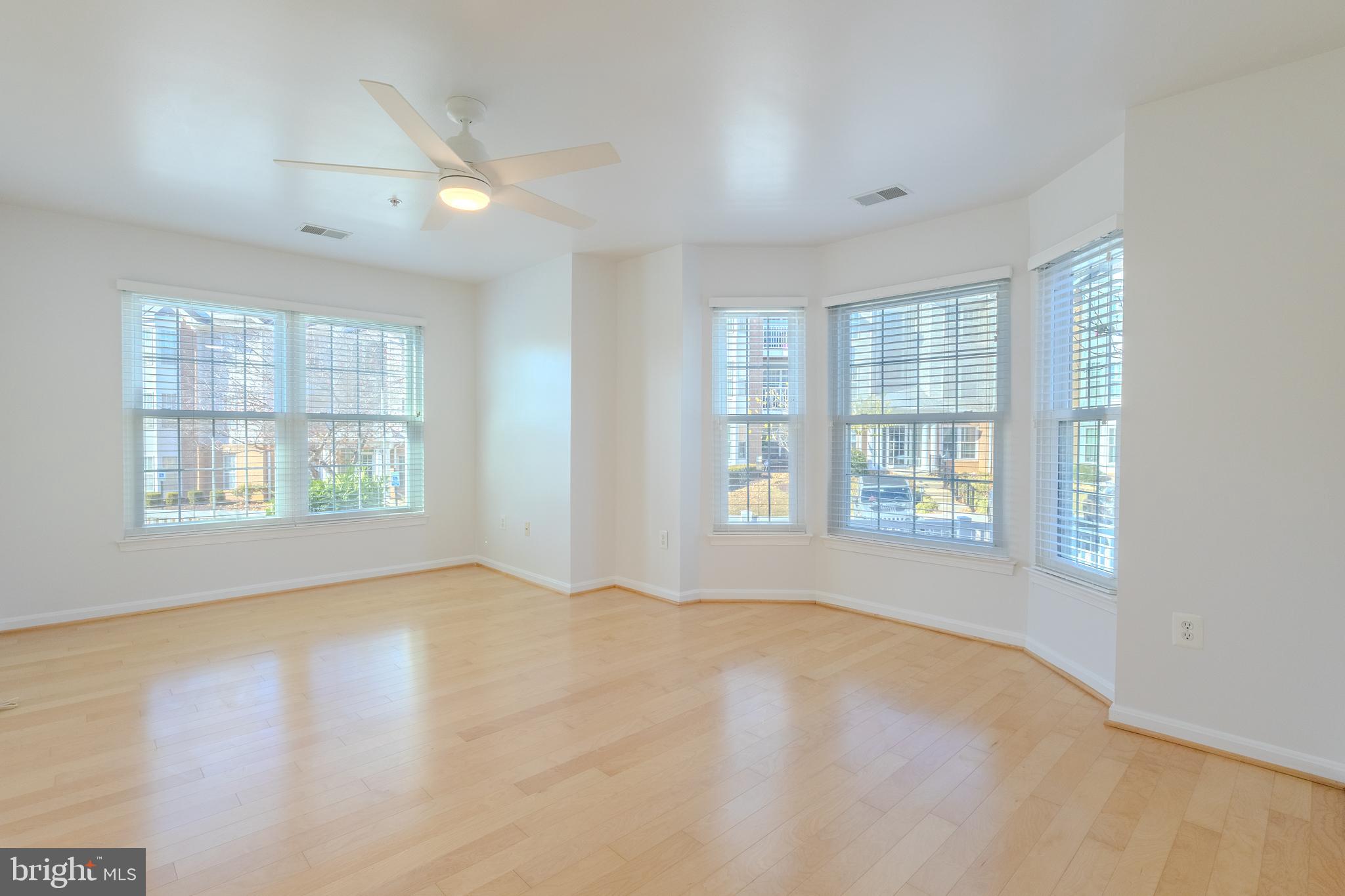 2015 Governor Thomas Bladen Way, Unit 104 Annapolis, MD 21401 - Photo 20 of 32 a view of an empty room with a window
