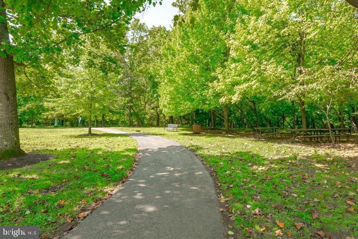 2015 Governor Thomas Bladen Way, Unit 104 Annapolis, MD 21401 - Photo 31 of 32 a view of outdoor space with deck and yard