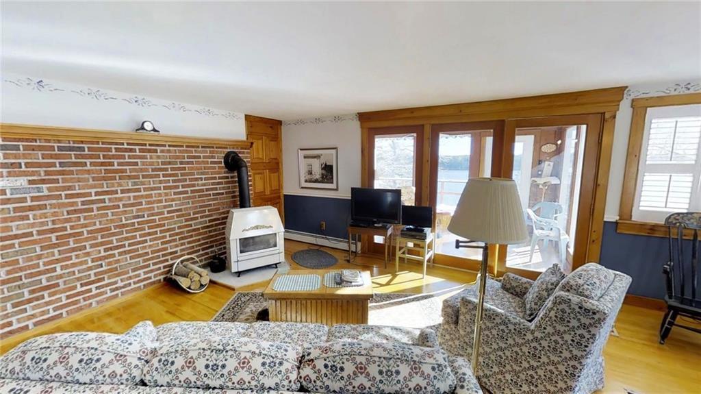 21 Log Cabin Road Westport Island, ME 04578 - Photo 12 of 33 Livingroom with the sunporch beyond....