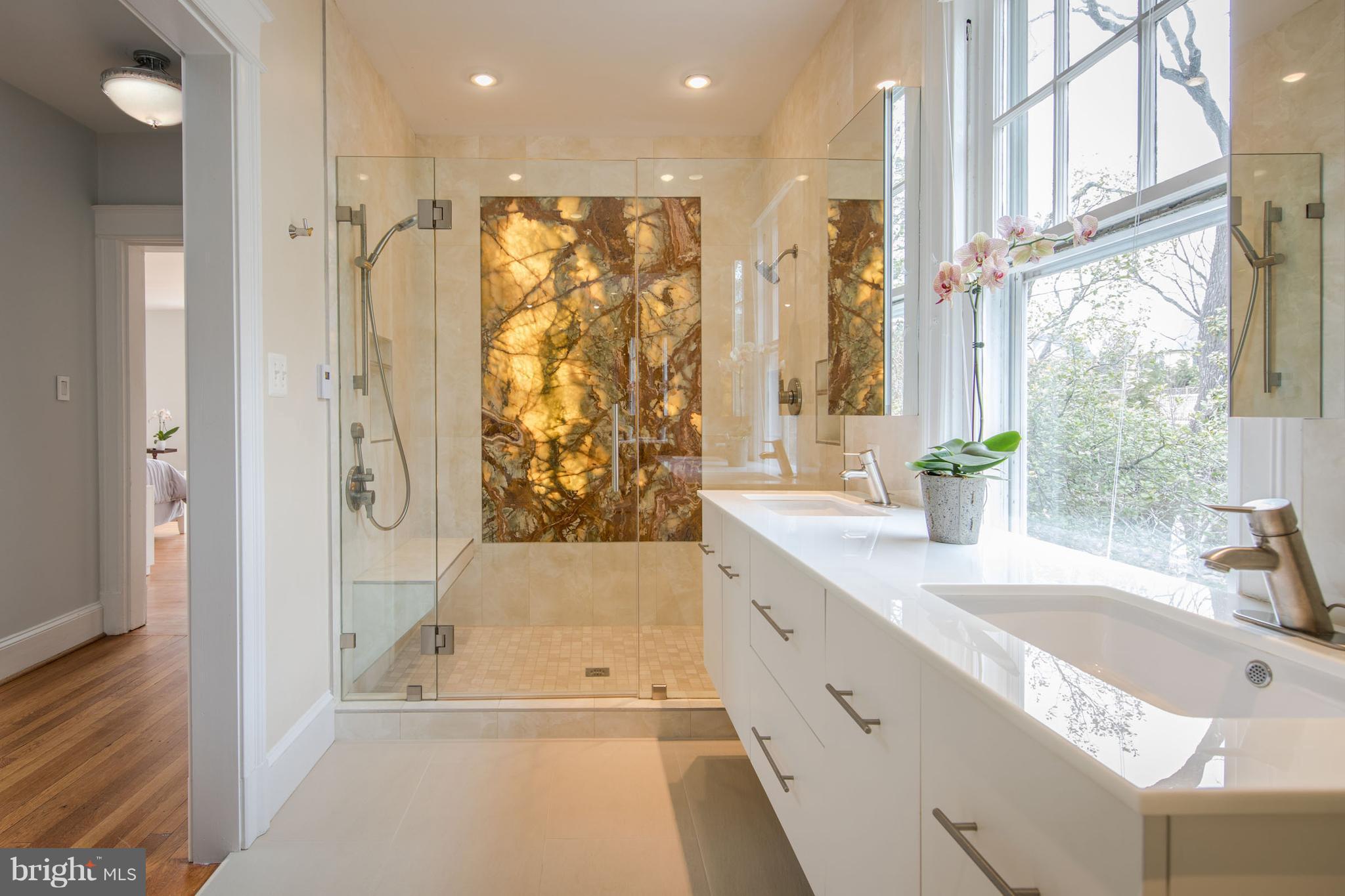3430 34th Place Northwest Washington, DC 20016 - Photo 19 of 29 a bathroom with a tub sink and mirror