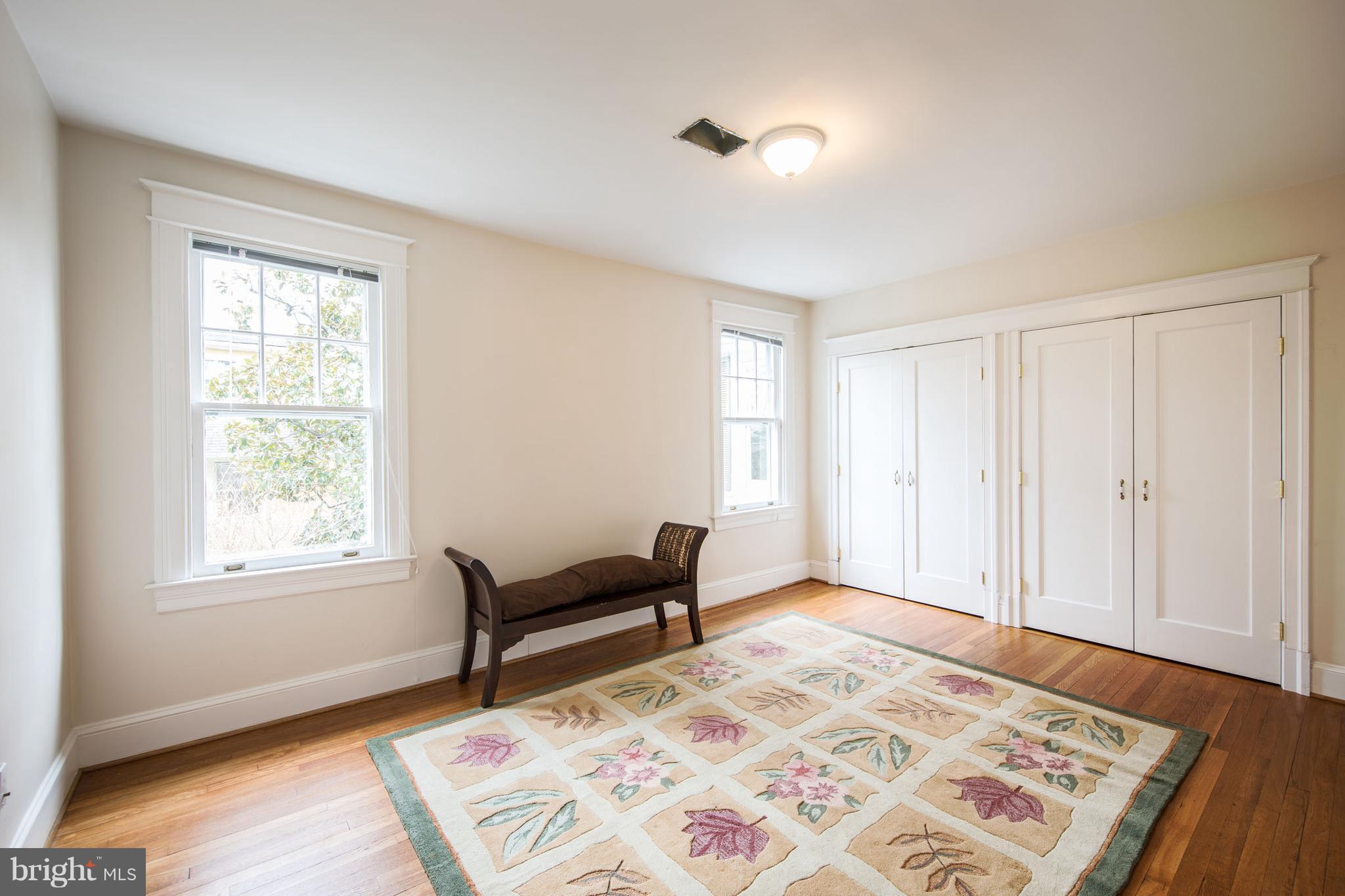 3430 34th Place Northwest Washington, DC 20016 - Photo 21 of 29 a bedroom with bed and a window
