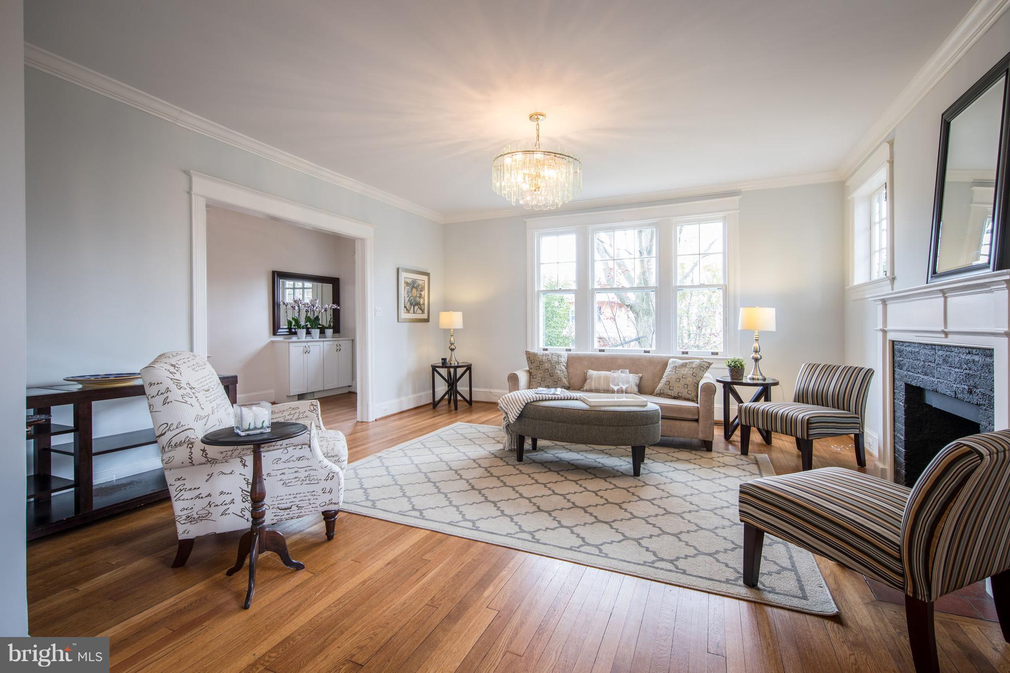 3430 34th Place Northwest Washington, DC 20016 - Photo 4 of 29 a living room with furniture and a fireplace