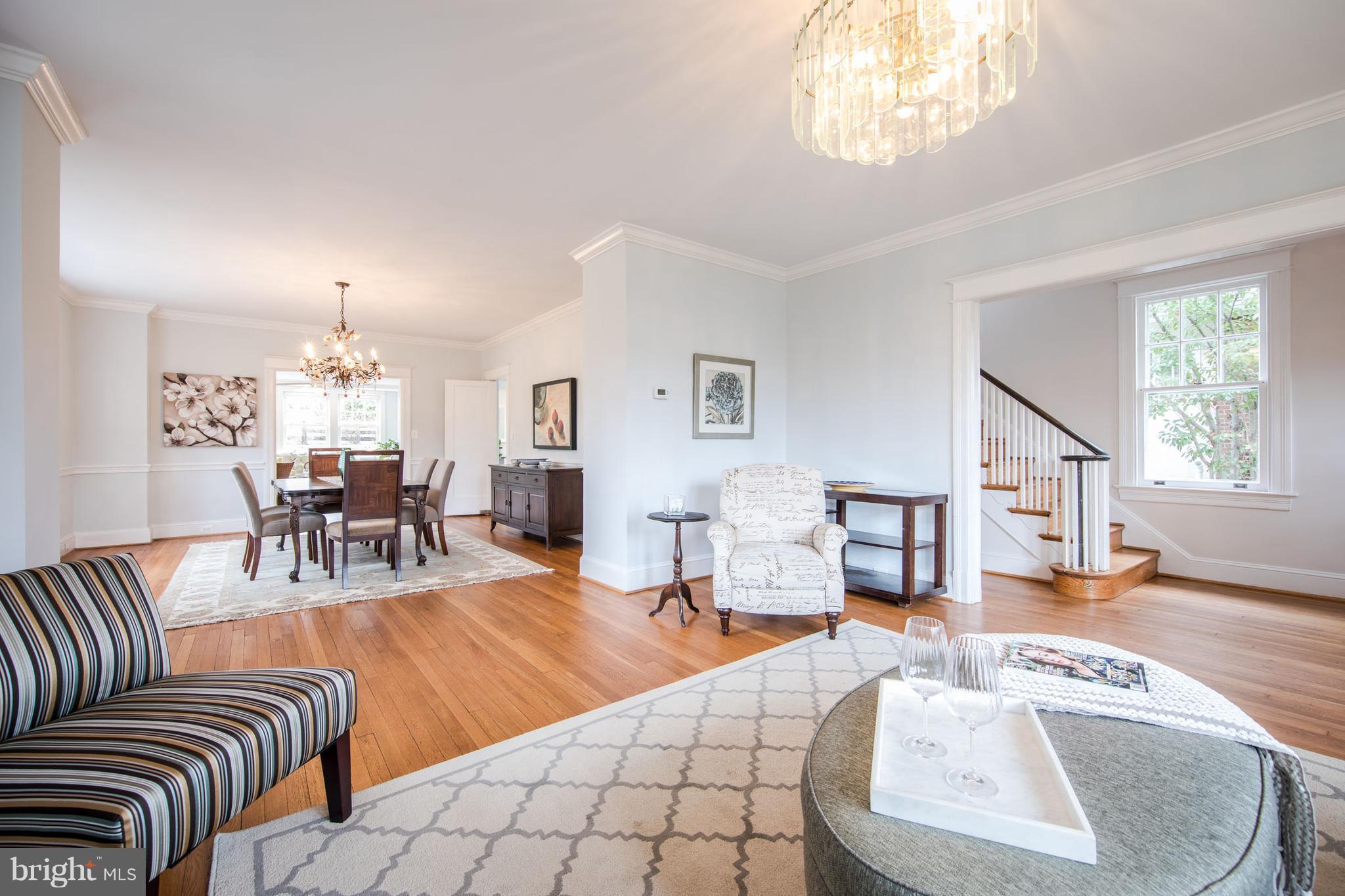 3430 34th Place Northwest Washington, DC 20016 - Photo 5 of 29 a living room with furniture and a chandelier