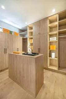 a view of kitchen with wooden floor and windows