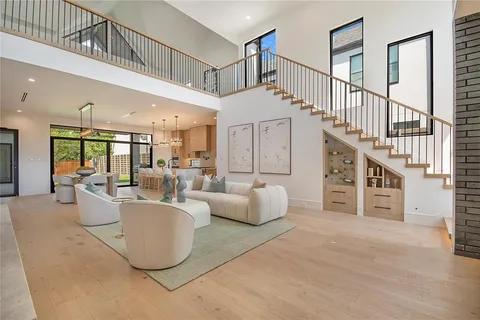 a living room with furniture or stairs and a couch