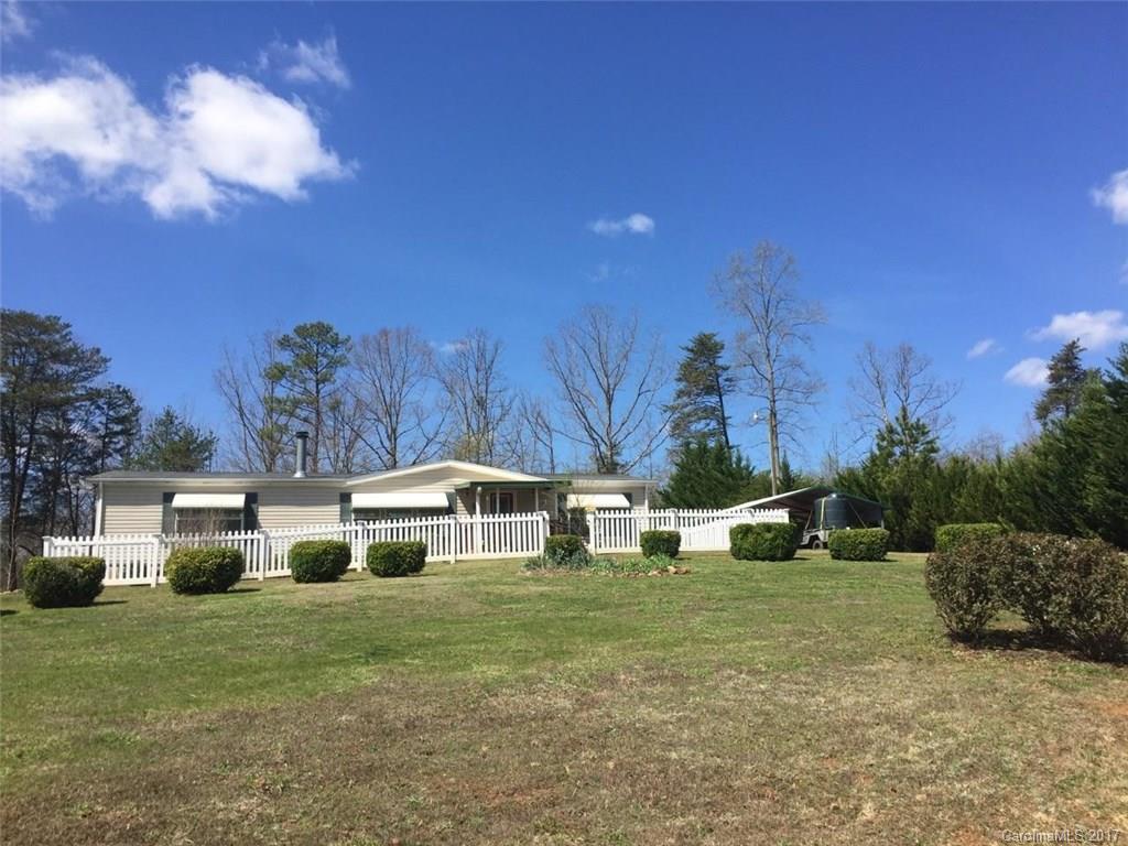 150 Buck Branch Rd Mill Spring Mill Spring, NC 28756 - Photo 1 of 22 a view of residential houses with yard