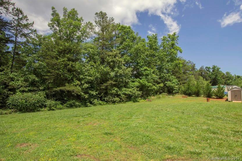 150 Buck Branch Rd Mill Spring Mill Spring, NC 28756 - Photo 21 of 22 a view of an outdoor space and a yard