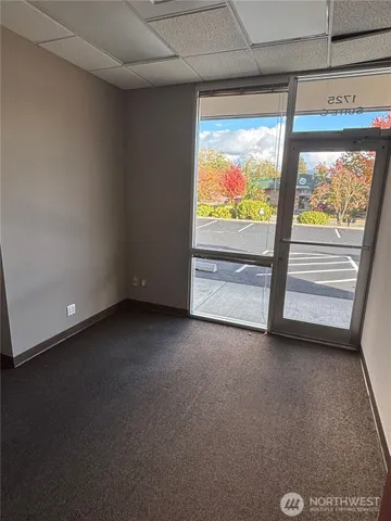 a kitchen with stainless steel appliances a refrigerator sink and cabinets
