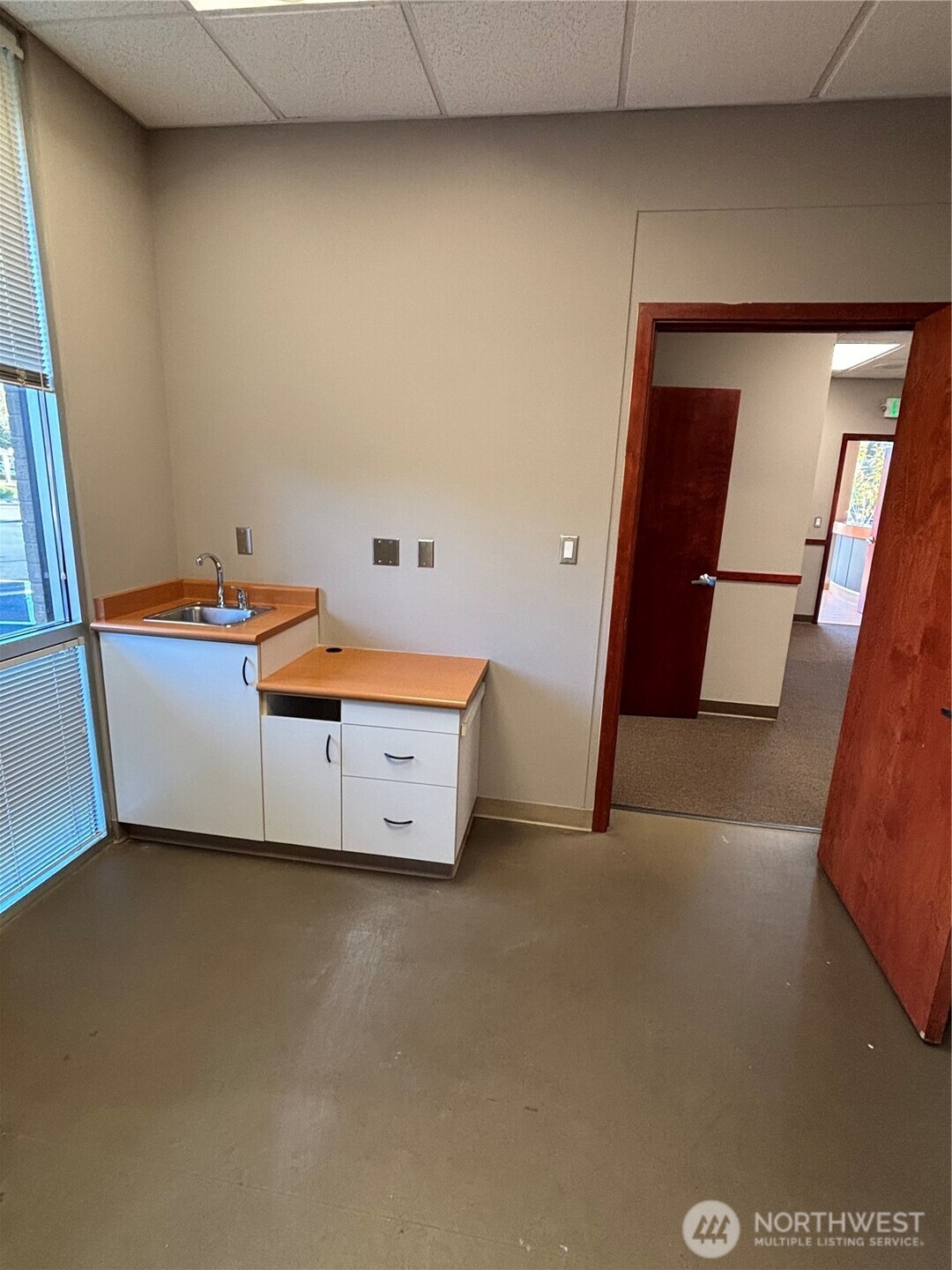 1725 Continental Place, Unit C Mount Vernon, WA 98273 - Photo 19 of 19 a room with furniture and white walls