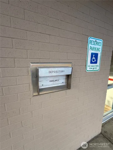 a view of an empty room with a large window