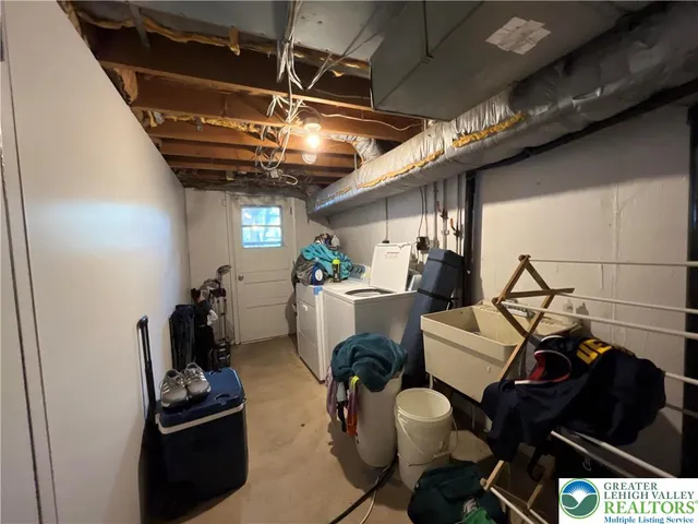 a room with furniture and wooden walls