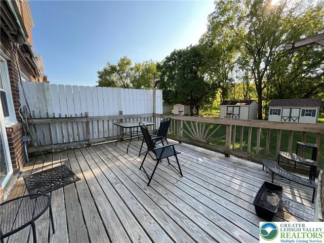 a view of balcony deck and patio