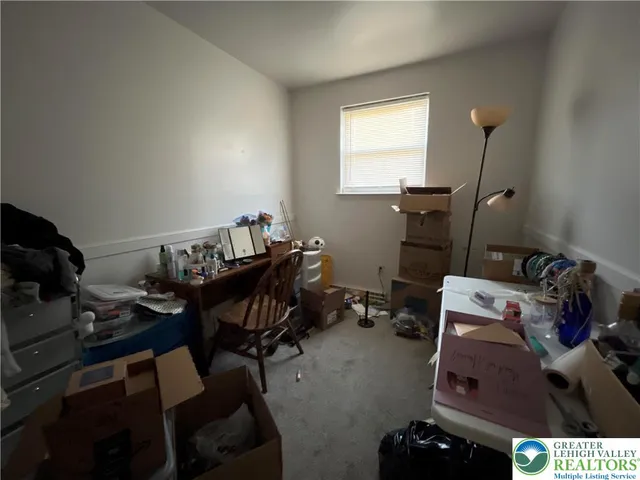 a room with furniture and a window