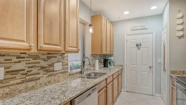 a kitchen with a stove and a microwave