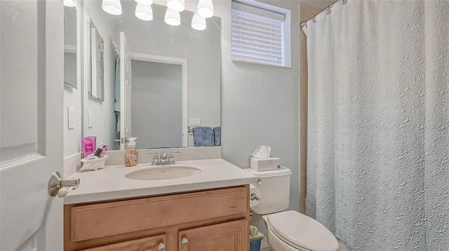 a close view of a utility room with dryer and washer