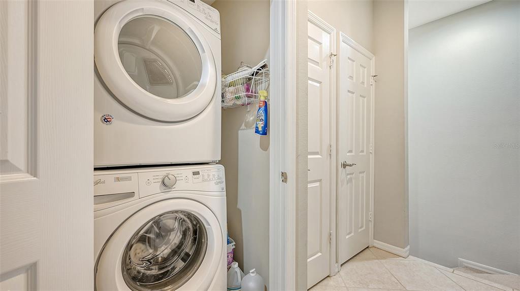 7240 Hamilton Road Bradenton, FL 34209 - Photo 29 of 46 a close view of a utility room with dryer and washer