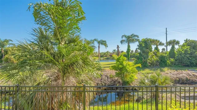 a view of a swimming pool with a lake view
