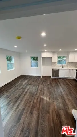 a view of kitchen and a window