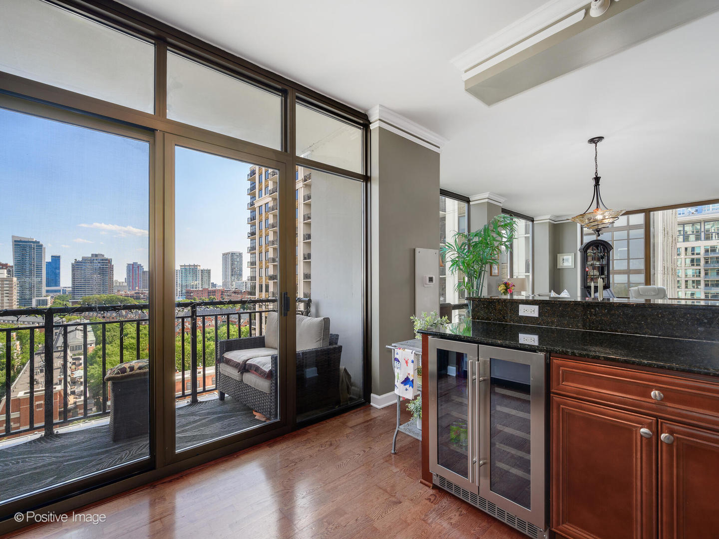 233 East 13th Street, Unit 1209 Chicago, IL 60605 - Photo 15 of 28 a kitchen with stainless steel appliances granite countertop a stove a sink and a refrigerator