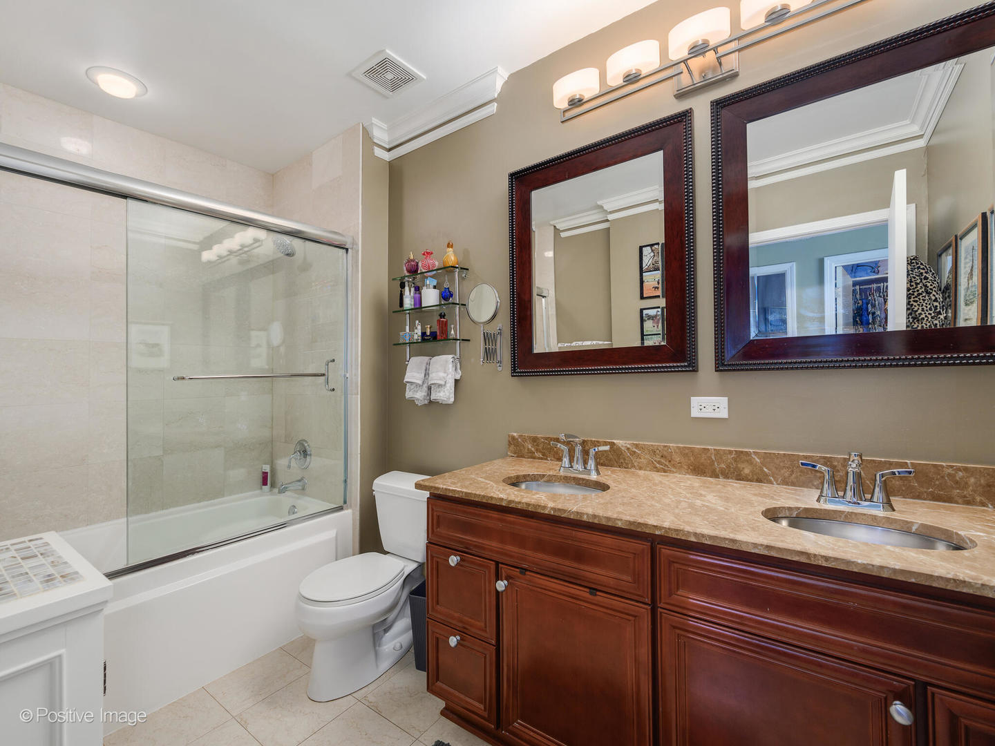 233 East 13th Street, Unit 1209 Chicago, IL 60605 - Photo 20 of 28 a bathroom with a sink a toilet and shower