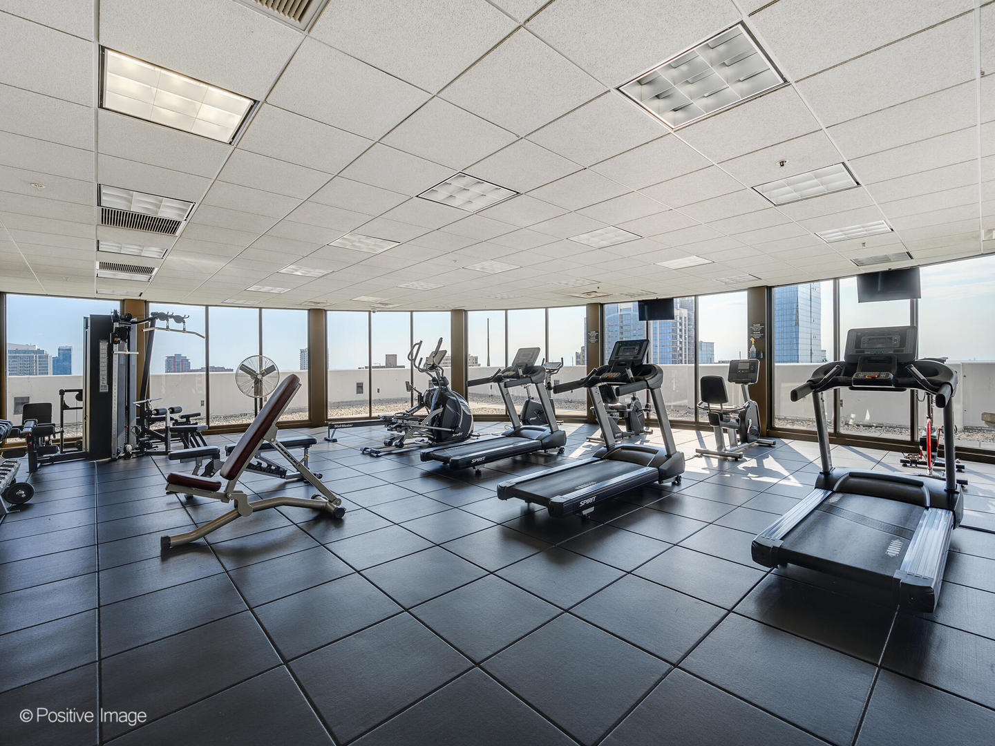 233 East 13th Street, Unit 1209 Chicago, IL 60605 - Photo 26 of 28 a very nice looking living room with gym equipment