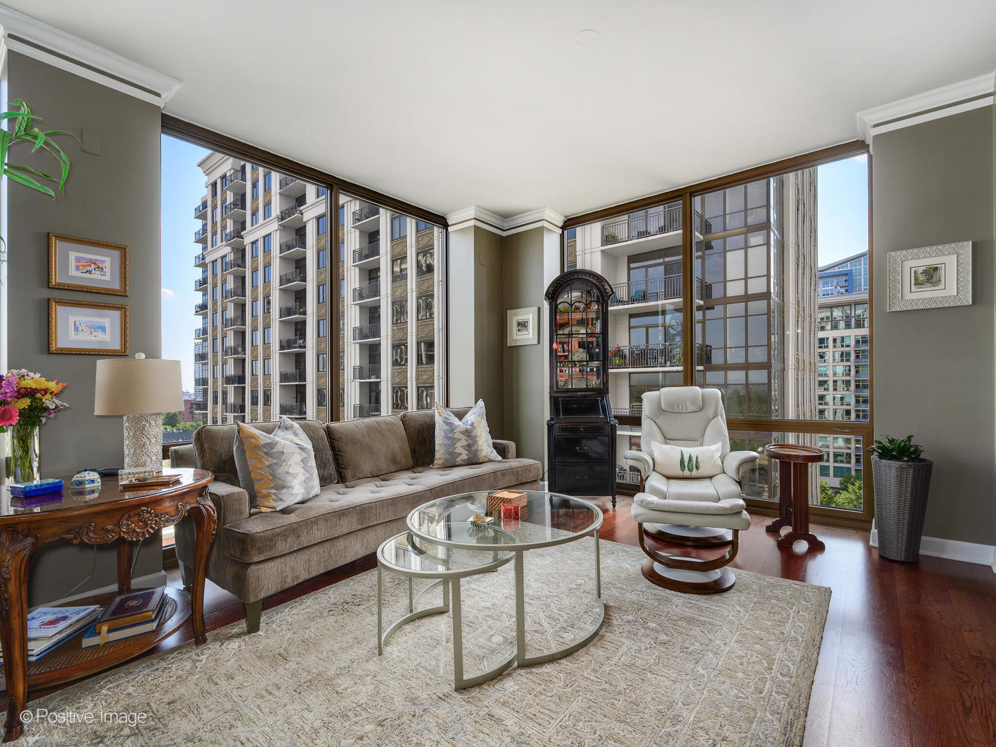 233 East 13th Street, Unit 1209 Chicago, IL 60605 - Photo 6 of 28 a living room with furniture and a large window