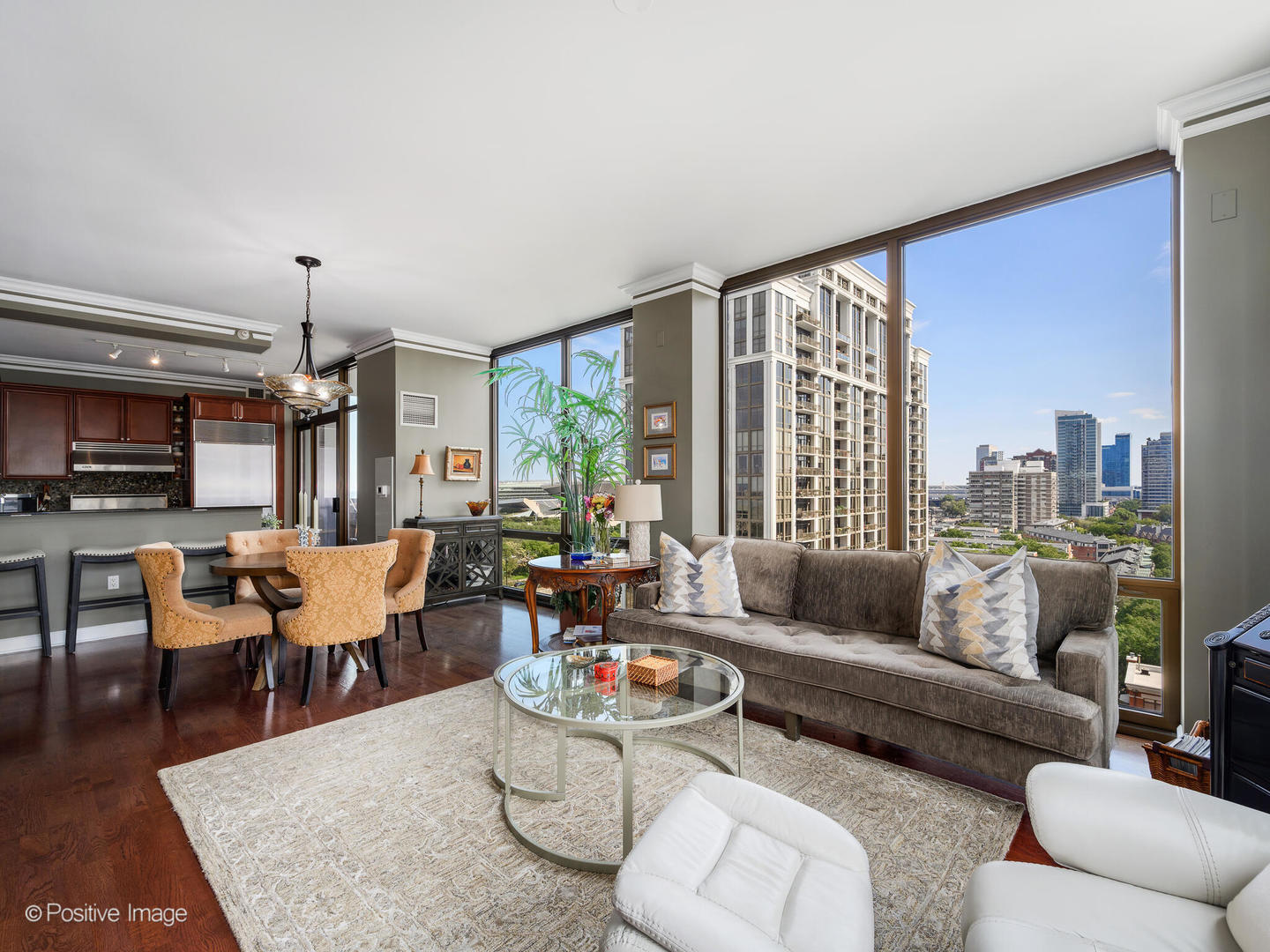 233 East 13th Street, Unit 1209 Chicago, IL 60605 - Photo 9 of 28 a living room with furniture and a large window