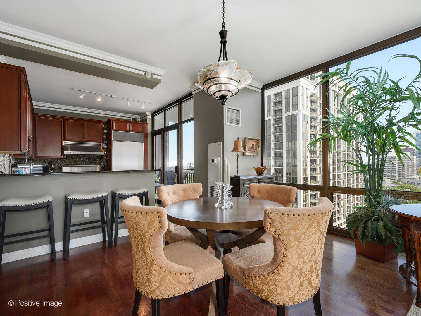 233 East 13th Street, Unit 1209 Chicago, IL 60605 - Photo 10 of 28 a view of a dining room with furniture window and wooden floor