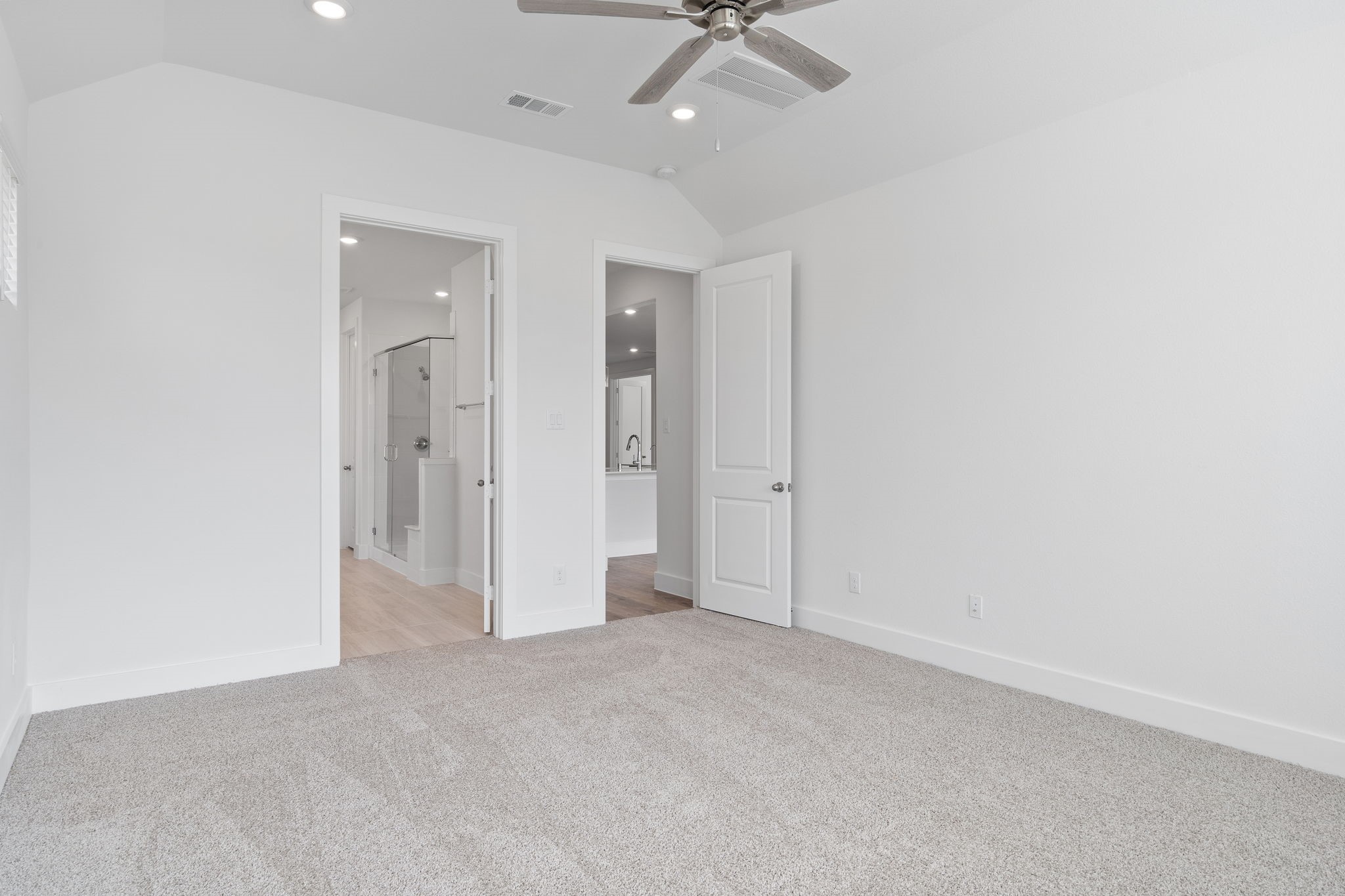 620 Cross Timbers Trace Waller, TX 77484 - Photo 23 of 36 an empty room with a ceiling fan and a window