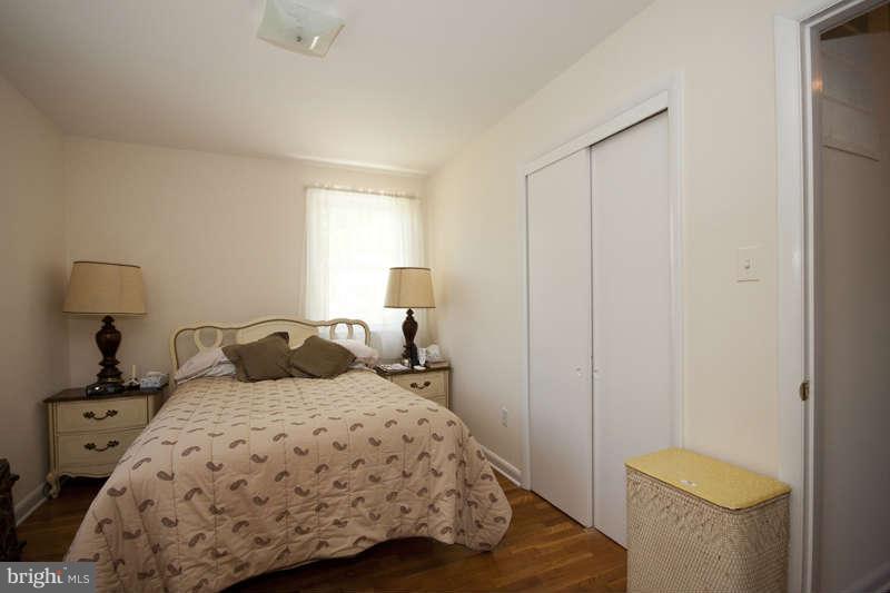 3927 Minden Road Silver Spring, MD 20906 - Photo 14 of 26 a bedroom with a bed and a window