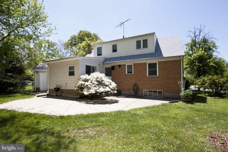 3927 Minden Road Silver Spring, MD 20906 - Photo 3 of 26 a front view of house with yard and green space