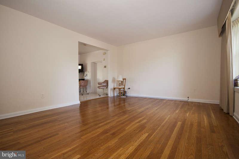 3927 Minden Road Silver Spring, MD 20906 - Photo 8 of 26 a view of empty room with wooden floor