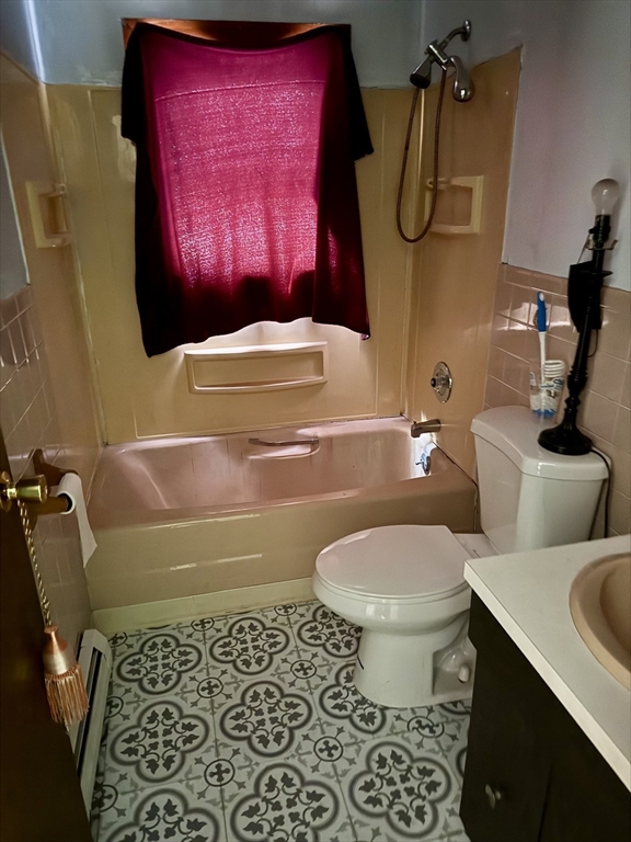 12 Warner Street Erving, MA 01344 - Photo 11 of 13 a bathroom with a toilet and a sink