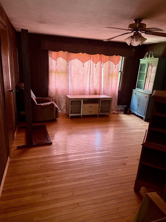 12 Warner Street Erving, MA 01344 - Photo 8 of 13 a living room with furniture and a large window