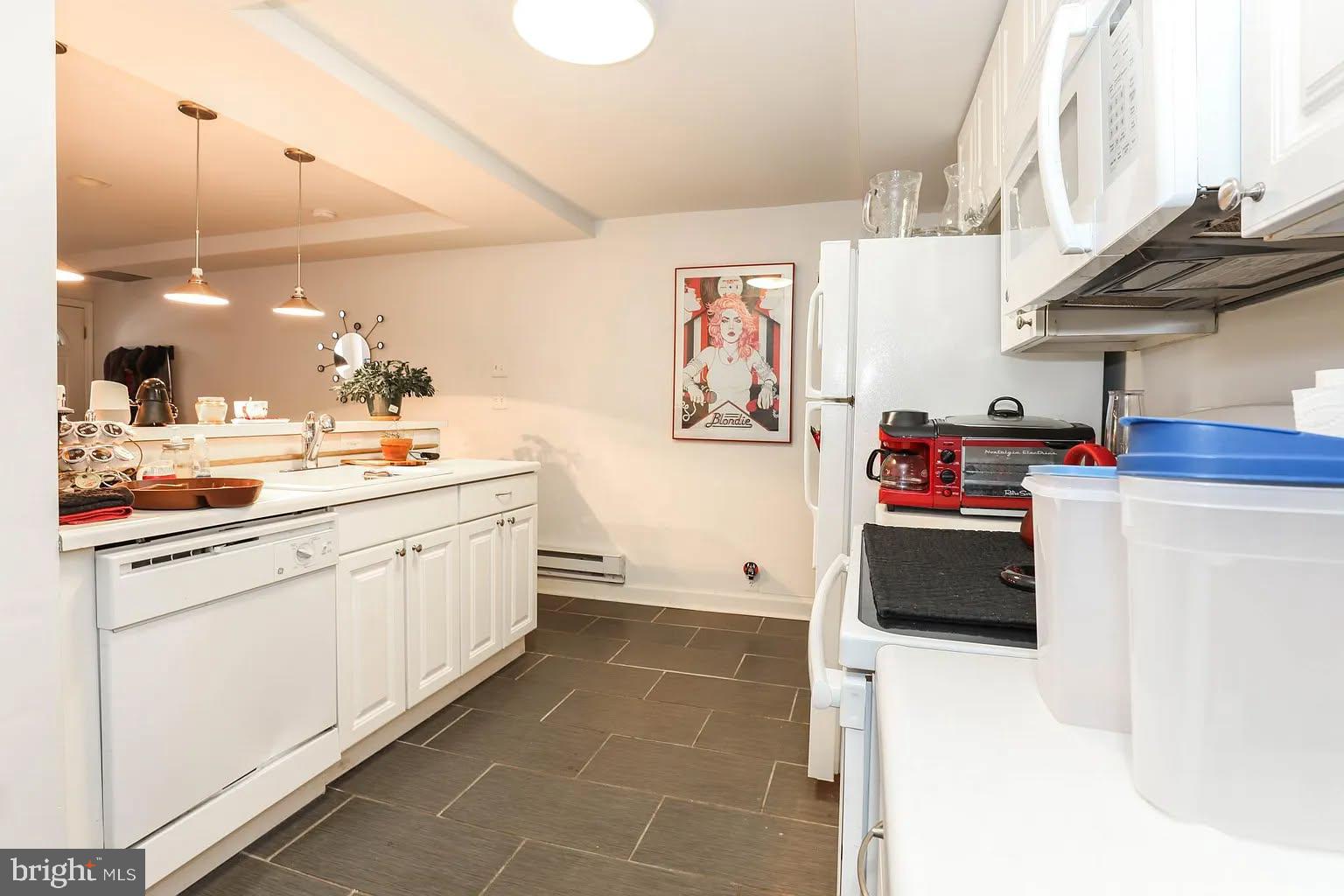 1451 W Street Northwest, Unit B Washington, DC 20009 - Photo 3 of 9 kitchen island