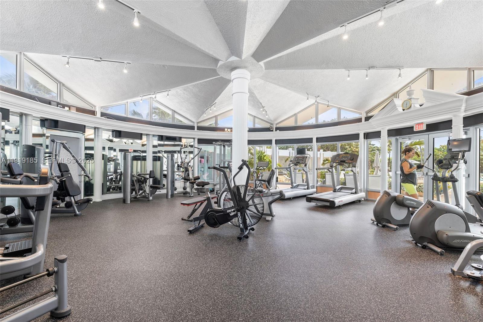 5055 Collins Avenue, Unit 6M Miami Beach, FL 33140 - Photo 29 of 42 a view of a room with gym equipment