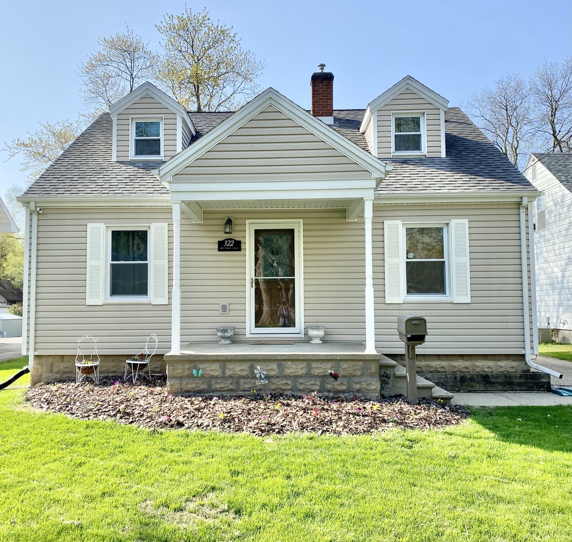 322 West Morgan Street Dixon, IL 61021 - Photo 1 of 20 a front view of a house with a yard