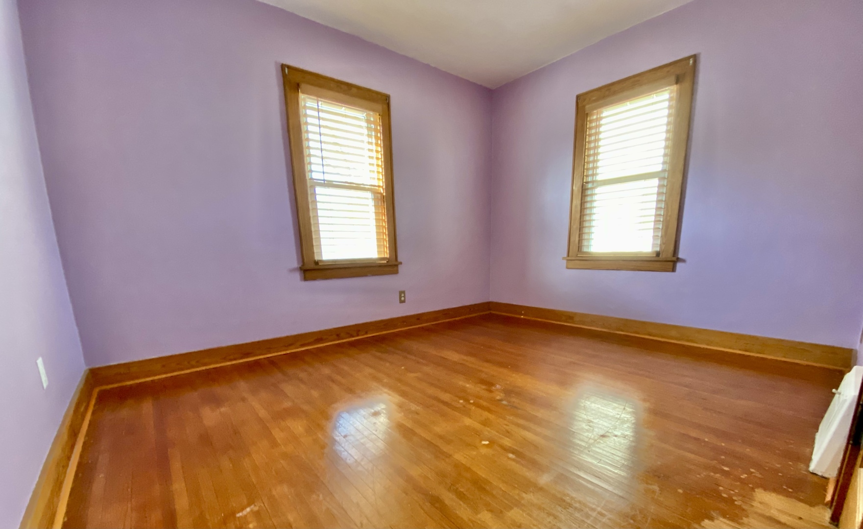 322 West Morgan Street Dixon, IL 61021 - Photo 12 of 20 a view of a room with window and a wooden floor