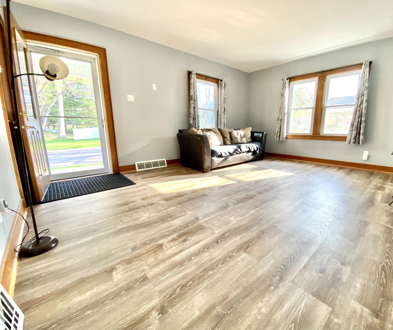 322 West Morgan Street Dixon, IL 61021 - Photo 6 of 20 a view of a bedroom with a bed and wooden floor