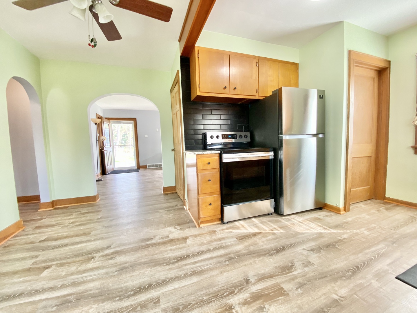 322 West Morgan Street Dixon, IL 61021 - Photo 8 of 20 a view of a kitchen with a sink and a refrigerator
