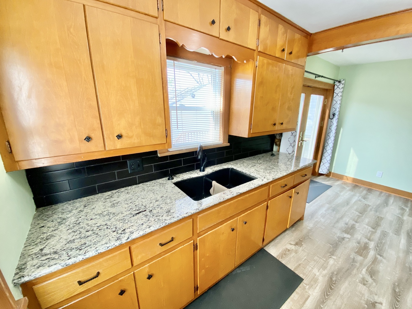 322 West Morgan Street Dixon, IL 61021 - Photo 9 of 20 a kitchen with sink and cabinets