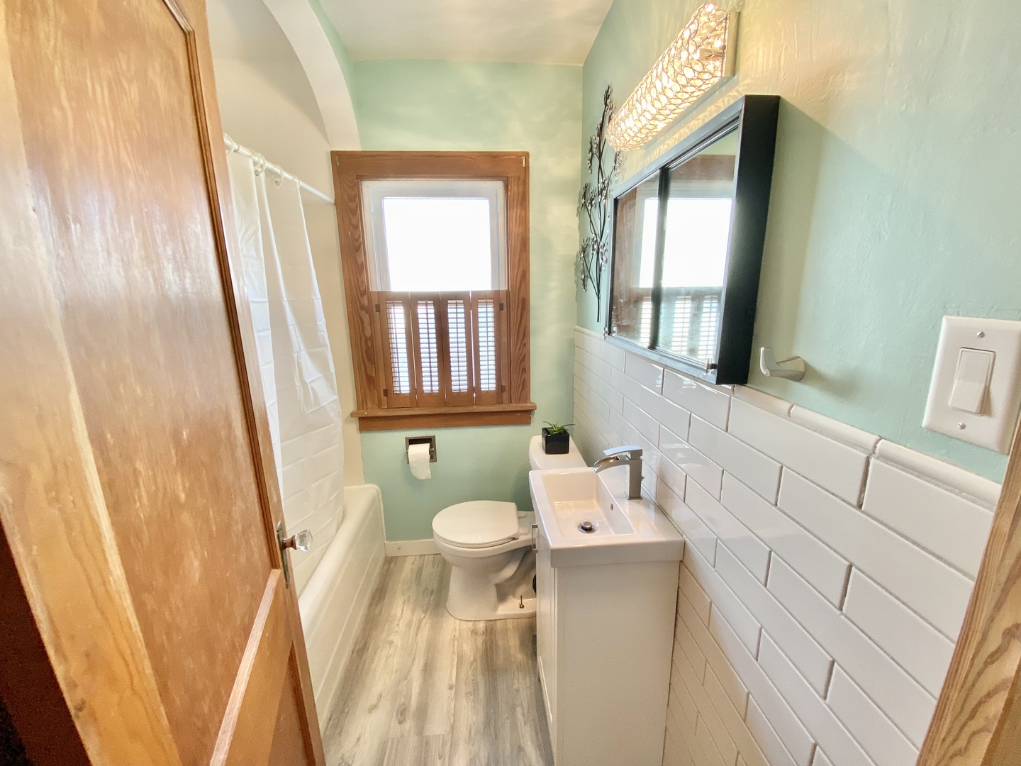 322 West Morgan Street Dixon, IL 61021 - Photo 10 of 20 a bathroom with a sink toilet and mirror