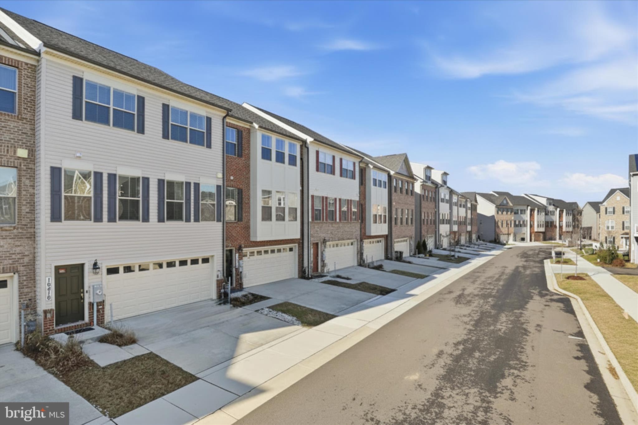 16416 Fife Way Bowie, MD 20716 - Photo 2 of 43 a view of a building with many windows