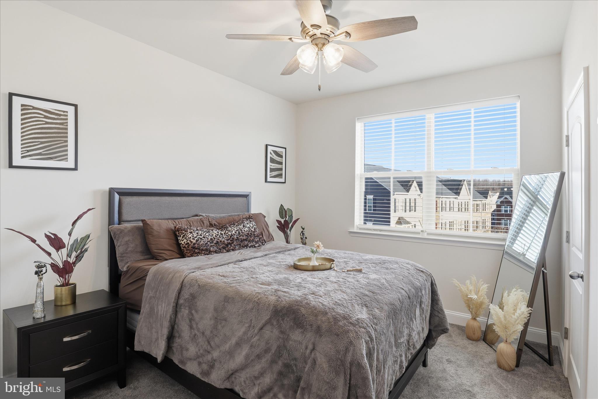 16416 Fife Way Bowie, MD 20716 - Photo 25 of 43 a bedroom with a large bed and a window