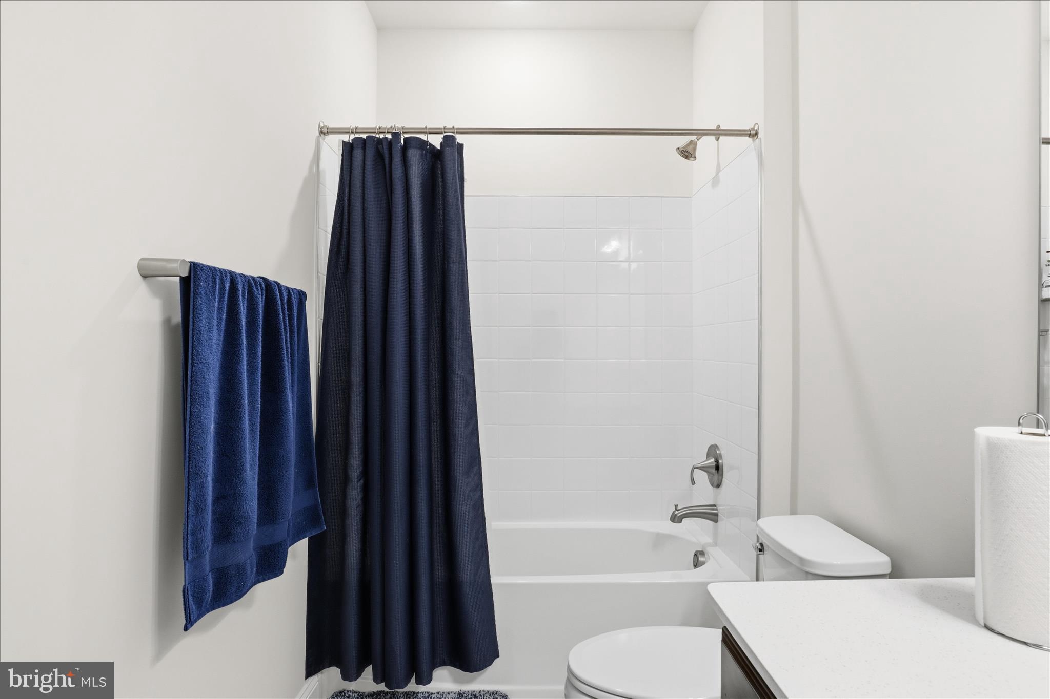 16416 Fife Way Bowie, MD 20716 - Photo 28 of 43 a bathroom with a toilet a sink and bathtub