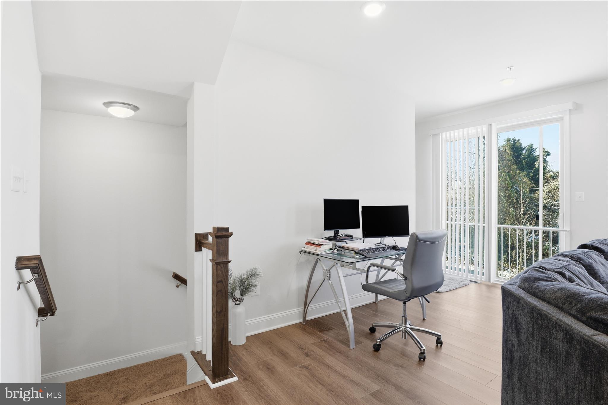 16416 Fife Way Bowie, MD 20716 - Photo 7 of 43 a view of a workspace with furniture and a window